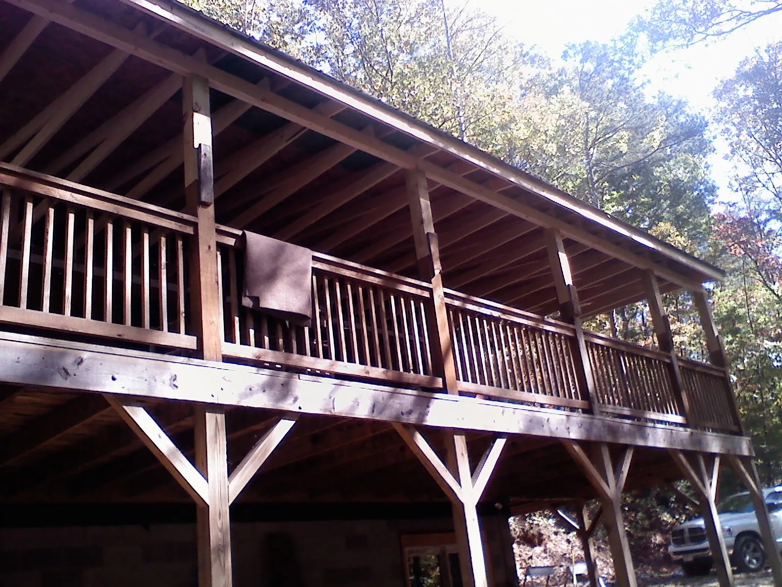 Timber framing under a new elevated porch and deck — Roof Leak Repair in Stafford by Roofing Brothers